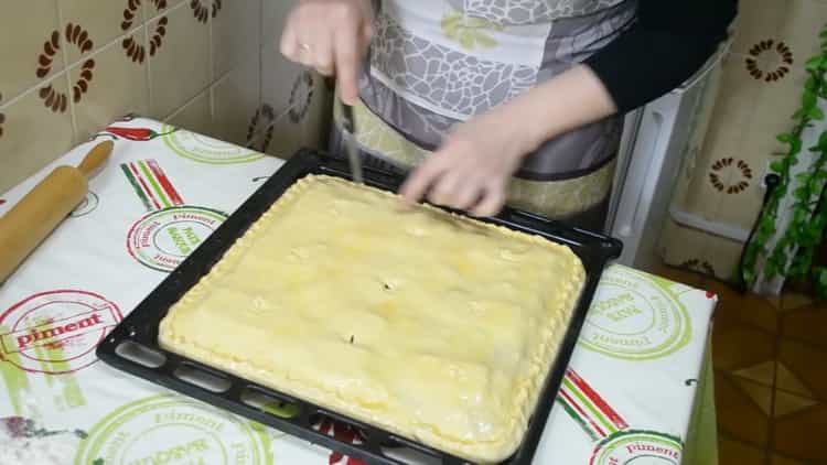 To make a pie with fish and potatoes make cuts