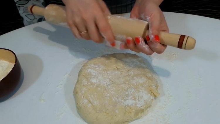 To make pizza at home, roll out the dough