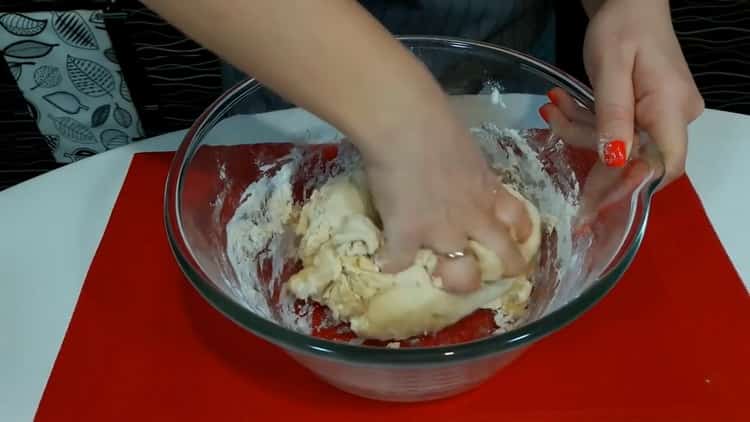 To make pizza at home, knead the dough.