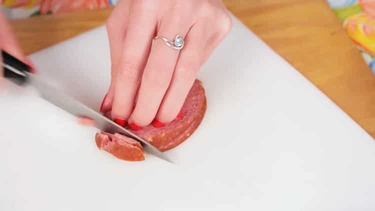 To prepare pizza in the microwave, prepare the ingredients