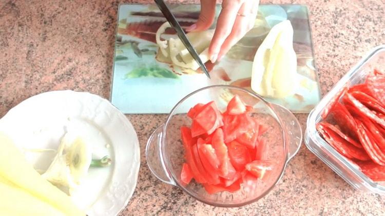 To make puff pastry pizza in the oven, chop the pepper