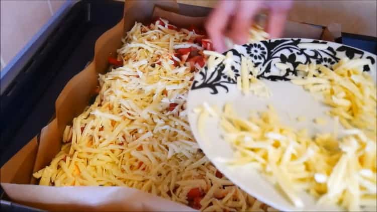 To make baked pizza, grate cheese