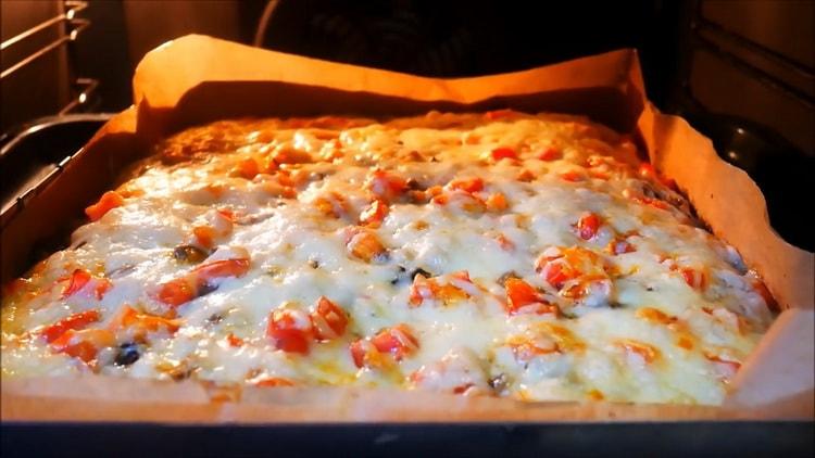 To bake pizza on batter, turn on the oven