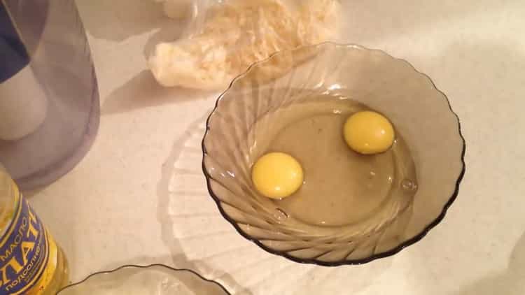 Cooking pizza in sour cream and mayonnaise in a pan