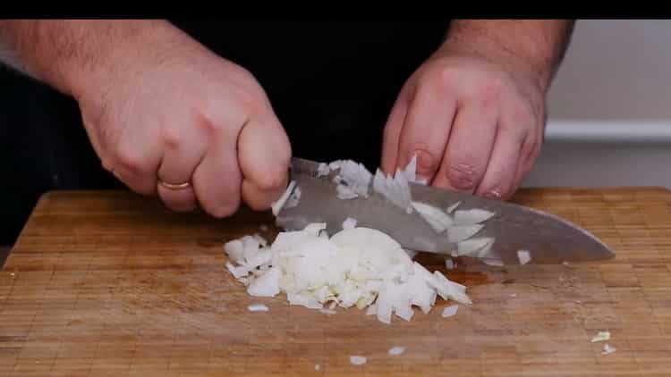 To make a pizza pie, chop the onion