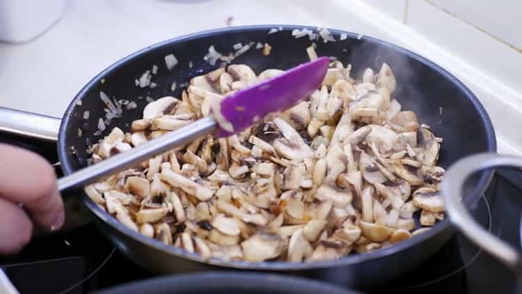 To make a pizza pie, chop the mushrooms
