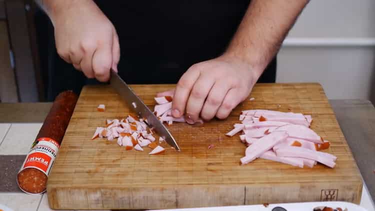 To make a pizza pie, chop the ham
