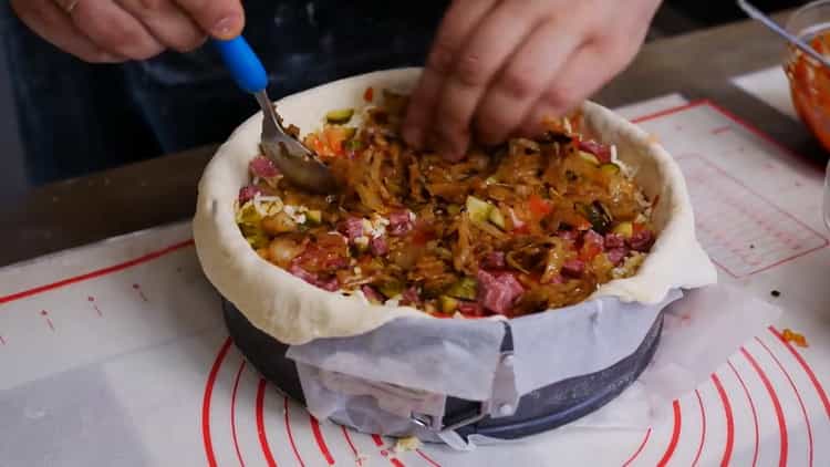 To make a pizza pie, mix the filling