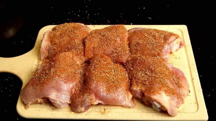 To cook rice with chicken in the oven, marinate the meat