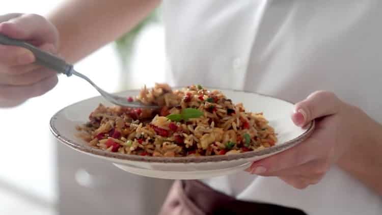 rice with vegetables and chicken is ready