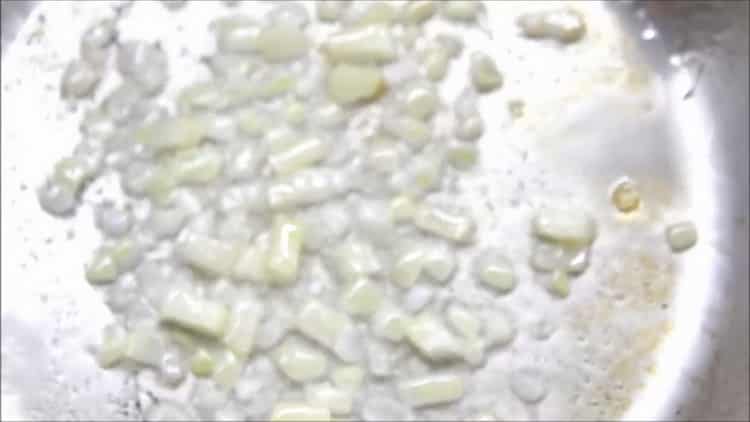 To cook fish in a creamy sauce, fry the onions