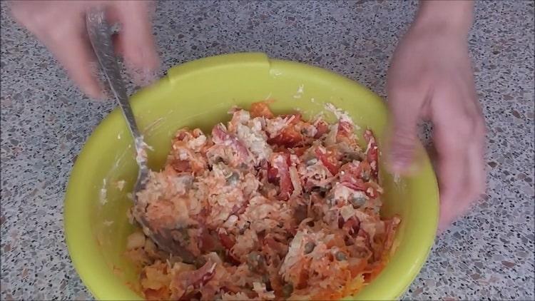To cook fish under a fur coat in the oven, prepare the minced meat