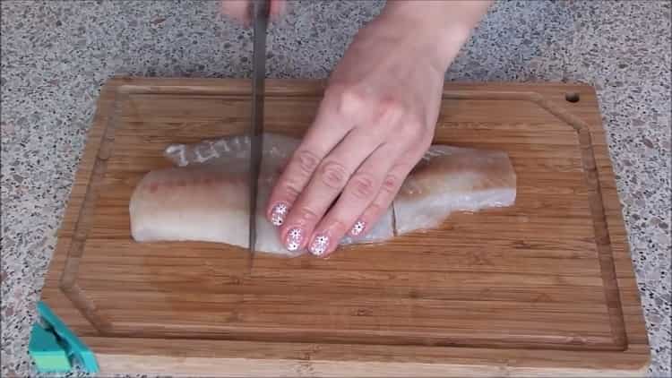 To cook fish under a fur coat in the oven, cut the fish