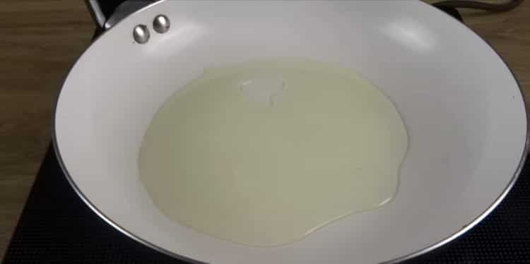 To cook fish and potatoes in the oven, preheat the pan