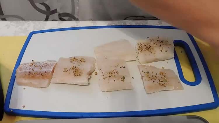 To cook fish with rice in the oven, cut the fish