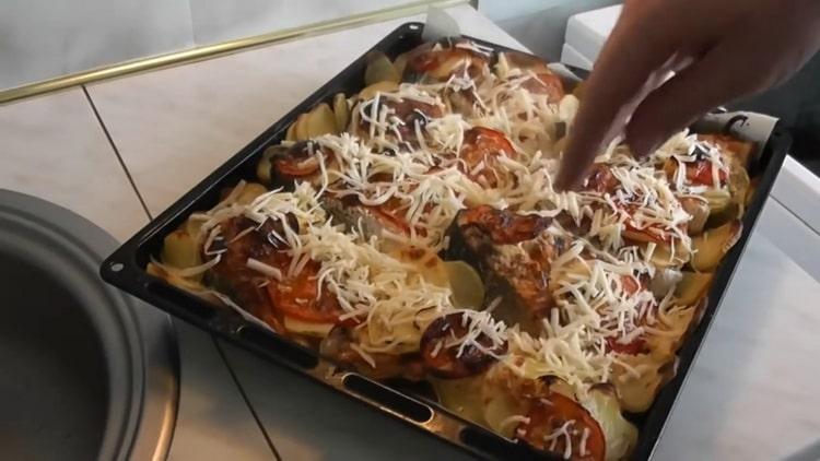 To cook salmon with potatoes in the oven, grate cheese