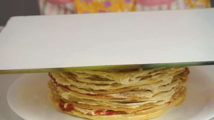 To prepare a puff cake, put a load on the workpiece