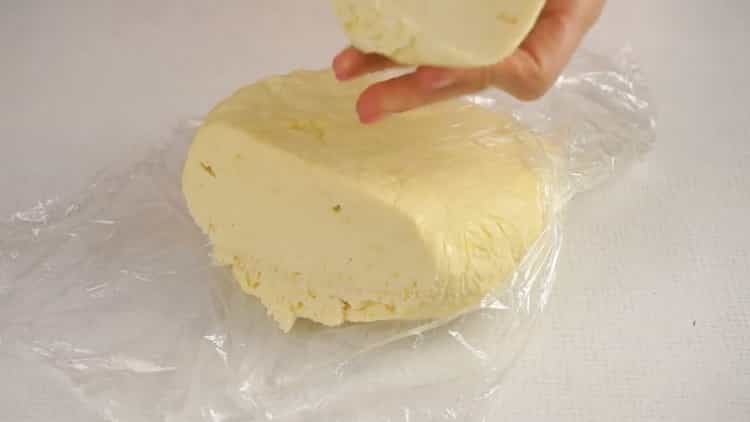To prepare a puff cake, cut the dough into portions