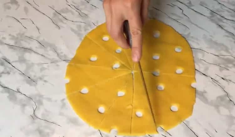 To make cheese biscuits, cut the dough