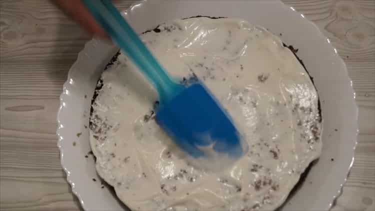 To make a pancho cake with pineapple and walnuts, coat the cake with cream