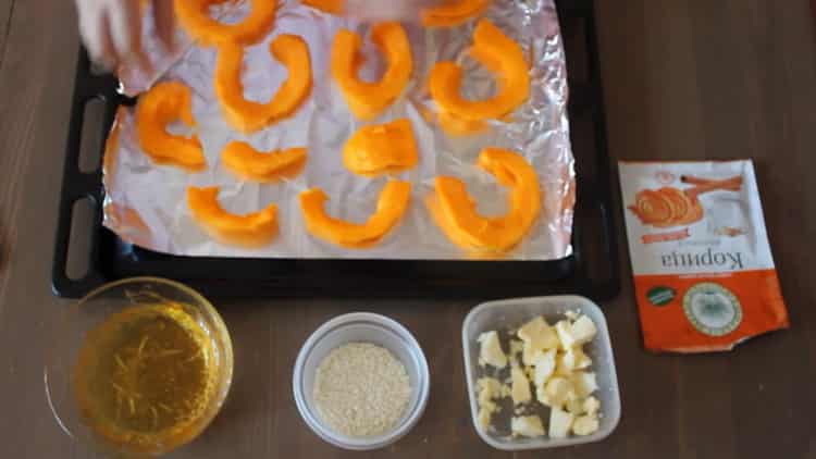 Put the pumpkin on a baking tray
