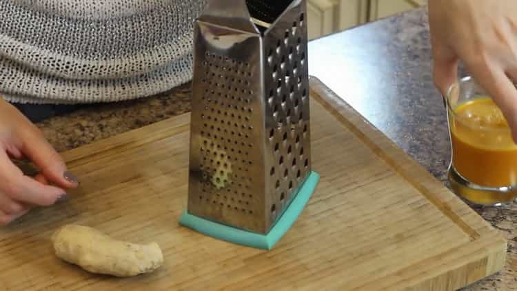 Grate ginger to make tea