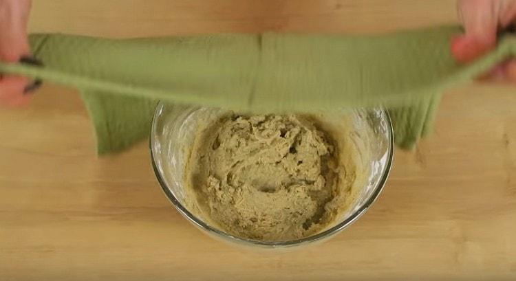 The resulting dough is left in a warm place to rise.