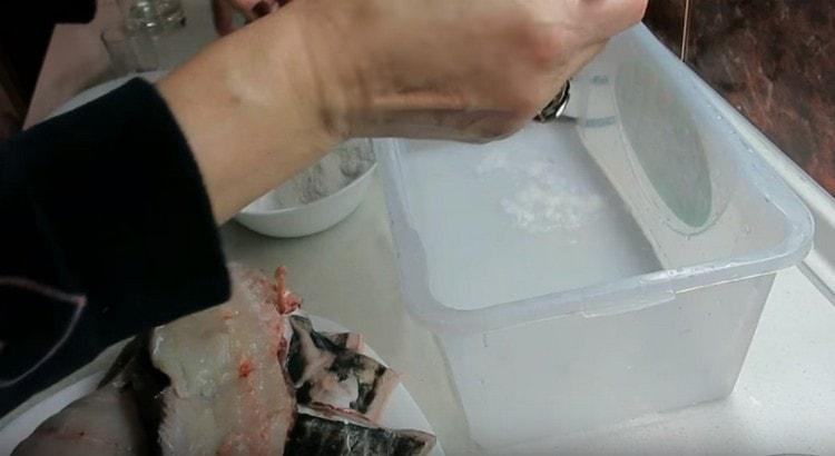 Pour a little mixture into the salting tank at the bottom.