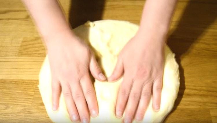 We crumble the rising dough.