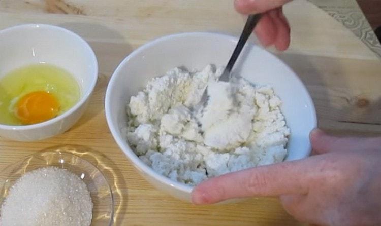 Knead the cottage cheese.