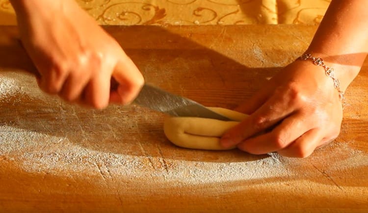 We turn the workpiece to one side and make a fairly deep cut on it.