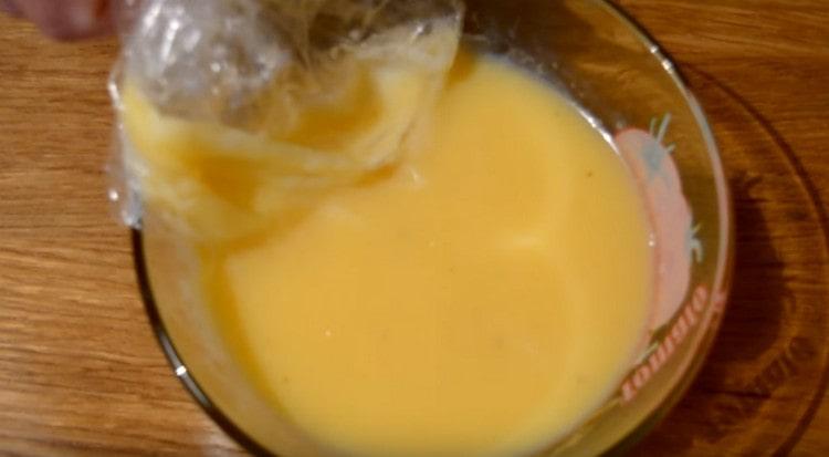 The cream should be allowed to cool slightly.