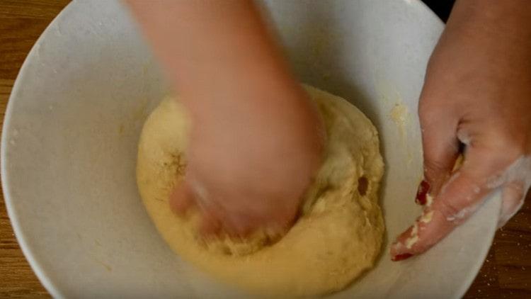 Knead the dough, it will be sticky.
