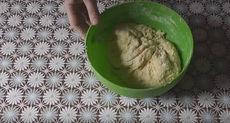 Knead the dough with your hands.