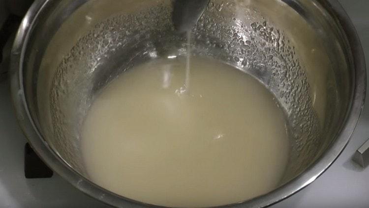 Cooking sugar syrup.