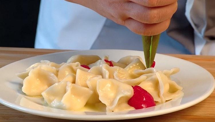 When serving, we decorate such dumplings with cheese with beetroot cream.