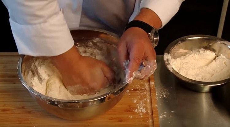 Add the remaining flour and knead a tighter dough.
