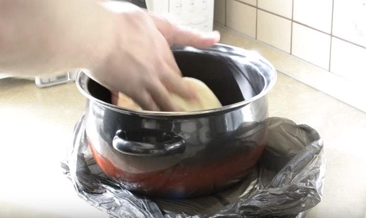 Now you need to knead the dough and let it rise again.