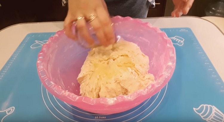 Add vegetable oil to the dough.