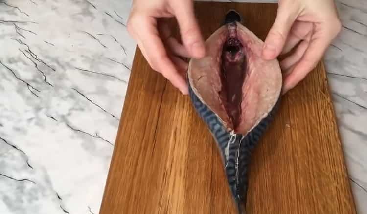 To cook stuffed mackerel, take out the ridge.