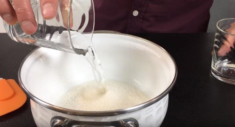 Add water to the sugar and mix.
