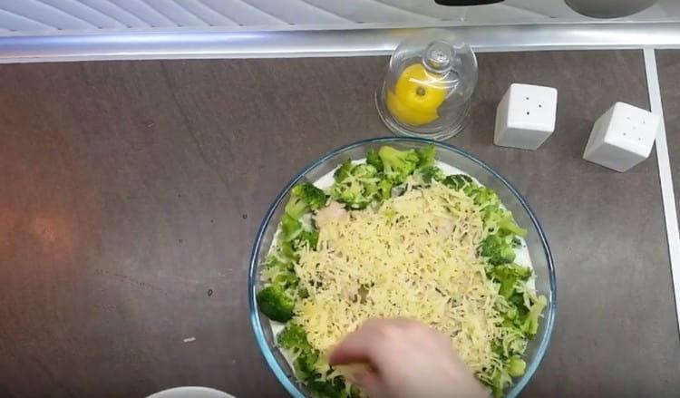 Sprinkle fish with cheese and return to the oven so that it melts.