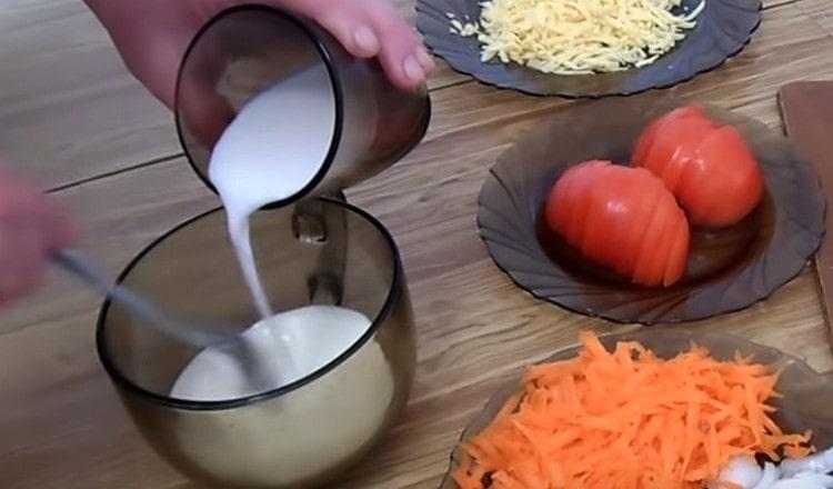 Mix sour cream with milk.