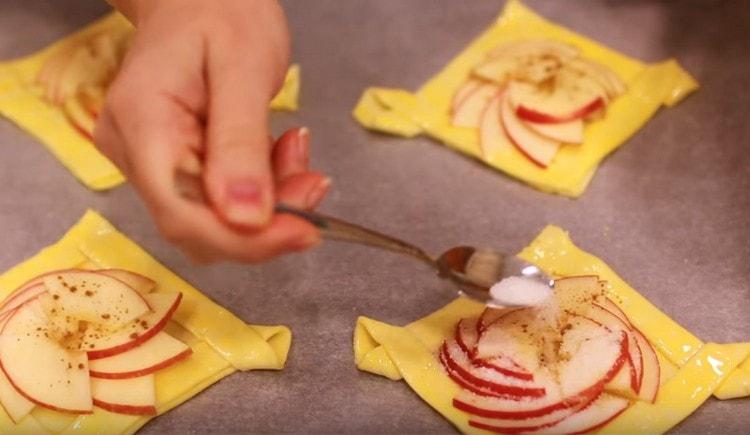 Sprinkle apples with sugar on top.