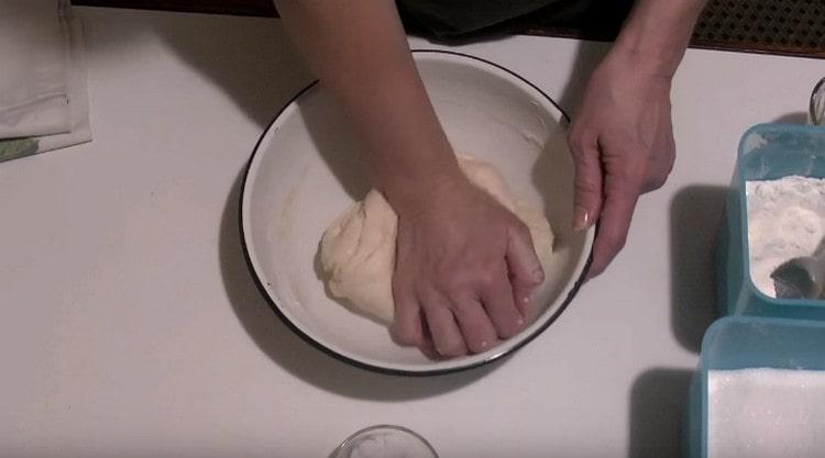 Knead the dough so that it incorporates all the butter.