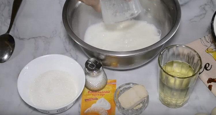Pour warm milk into a bowl.