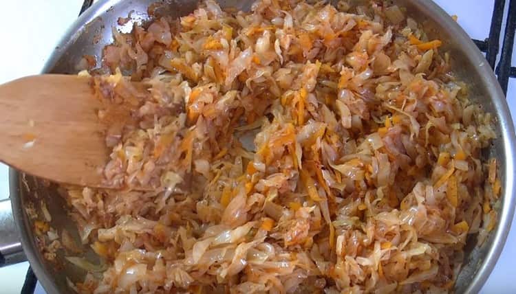 Stew the cabbage until half ready.