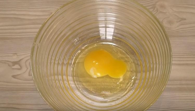 We beat the egg in a bowl.