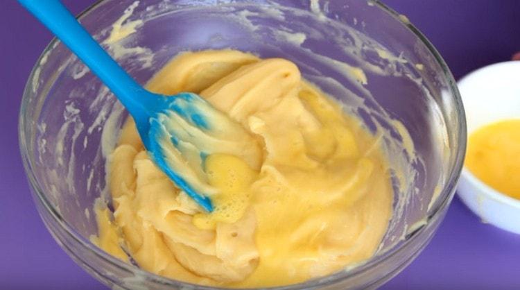 Beat the fourth egg with a fork and add a little bit to the dough.