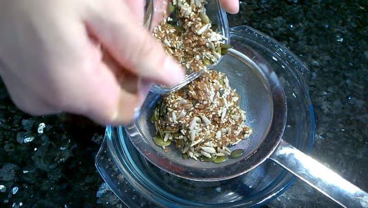 Then the seeds need to be thrown back onto the strainer.